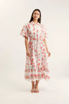 Woman wearing a floral dress on a white background