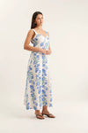 Woman wearing a floral dress on a white background