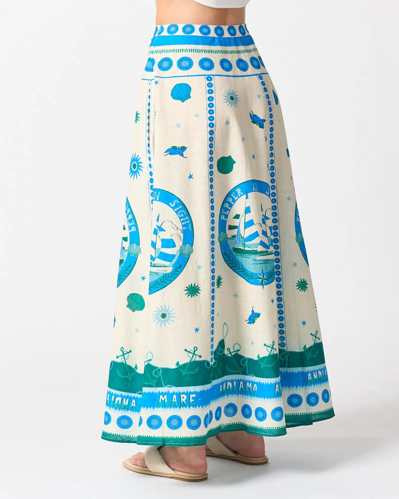 Long skirt with blue and green patterns on a white background