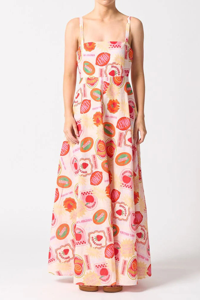 Long dress with fruit pattern on a white background